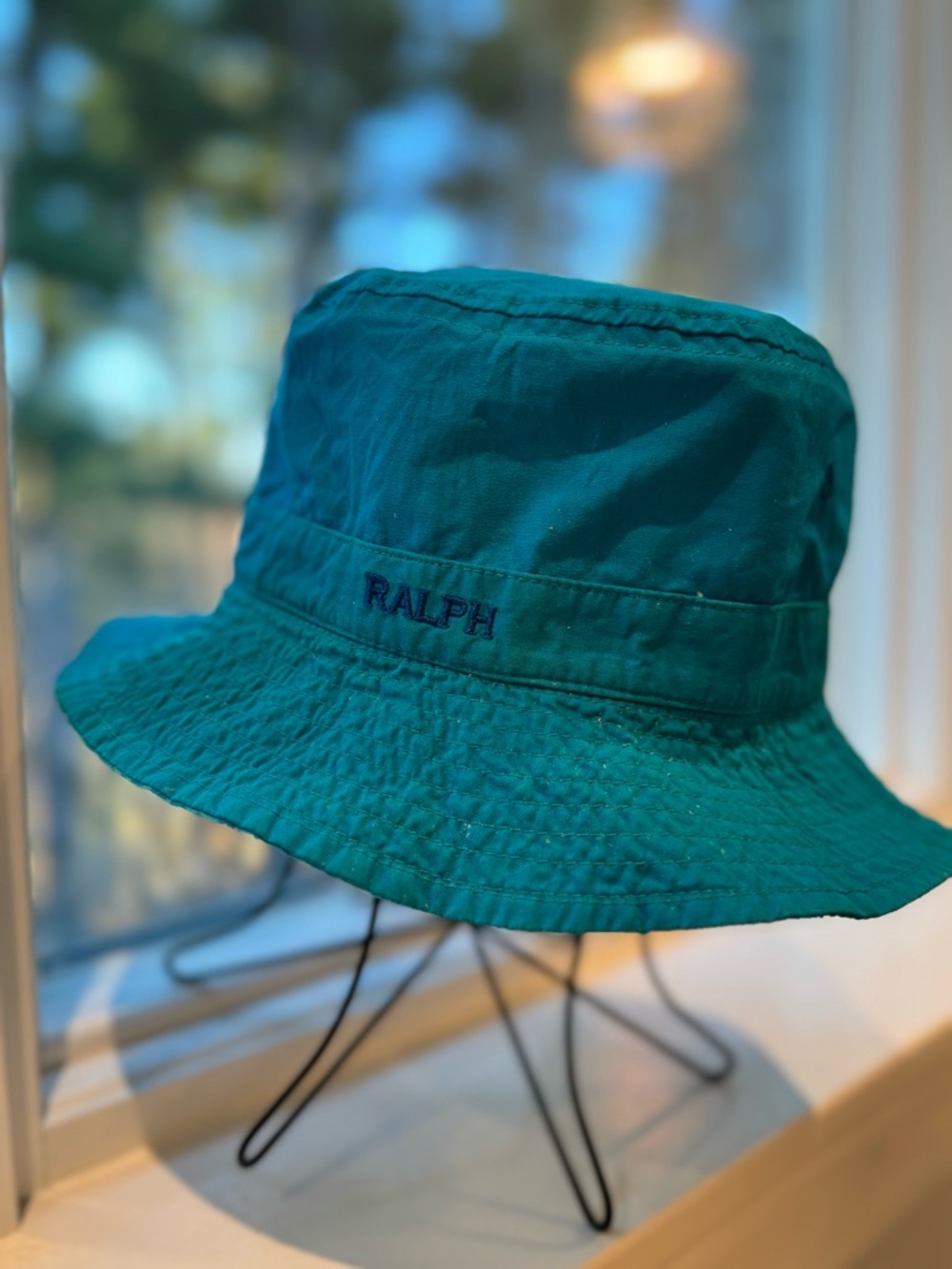 Ralph Lauren reversible hat. Capri blue on one side  and batik blues inside